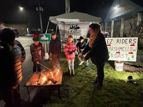 EZ Riders kids roasting marshmallows