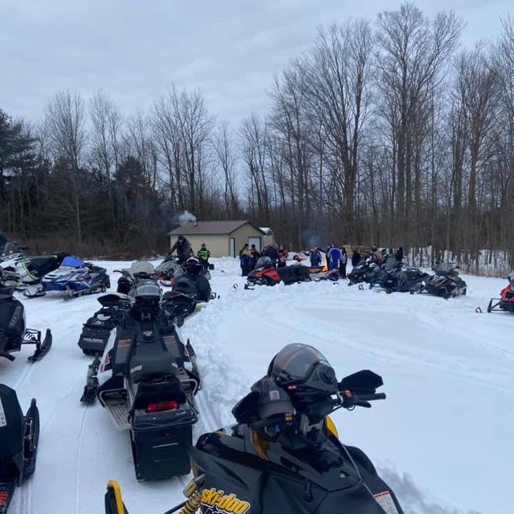 Snowmobiles lined up